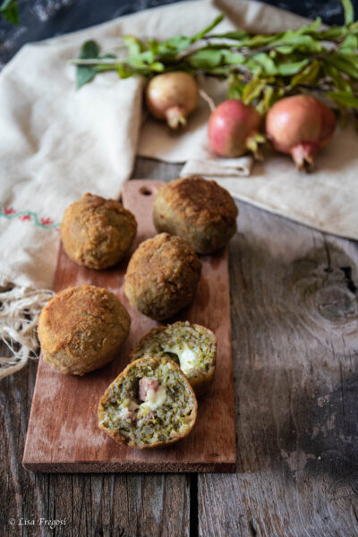 arancine al pesto di pistacchi con mortadella e provola